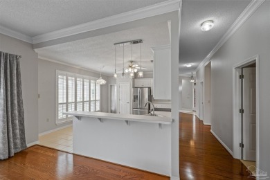 Located at 1456 Champions Green Drive in Gulf Breeze, Florida on Tiger Point Golf and Country Club in Florida - for sale on GolfHomes.com, golf home, golf lot