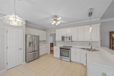 Located at 1456 Champions Green Drive in Gulf Breeze, Florida on Tiger Point Golf and Country Club in Florida - for sale on GolfHomes.com, golf home, golf lot