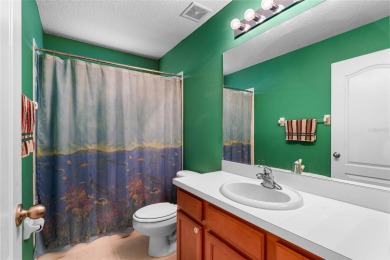 Discover the perfect blend of style, comfort, and privacy in the on Heritage Harbor Golf and Country Club in Florida - for sale on GolfHomes.com, golf home, golf lot