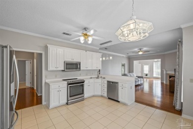 Located at 1456 Champions Green Drive in Gulf Breeze, Florida on Tiger Point Golf and Country Club in Florida - for sale on GolfHomes.com, golf home, golf lot