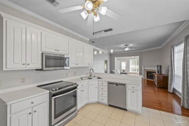 Located at 1456 Champions Green Drive in Gulf Breeze, Florida on Tiger Point Golf and Country Club in Florida - for sale on GolfHomes.com, golf home, golf lot