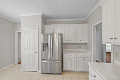 Located at 1456 Champions Green Drive in Gulf Breeze, Florida on Tiger Point Golf and Country Club in Florida - for sale on GolfHomes.com, golf home, golf lot
