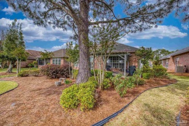 Located at 1456 Champions Green Drive in Gulf Breeze, Florida on Tiger Point Golf and Country Club in Florida - for sale on GolfHomes.com, golf home, golf lot