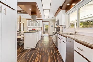 Welcome to this remarkable ranch-style residence, perfectly on Myrtlewood Golf Course and Club  in South Carolina - for sale on GolfHomes.com, golf home, golf lot