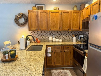 Welcome to your beautifully upgraded, walk-in, townhouse-style on Mountain Ranch Golf Club in Arkansas - for sale on GolfHomes.com, golf home, golf lot