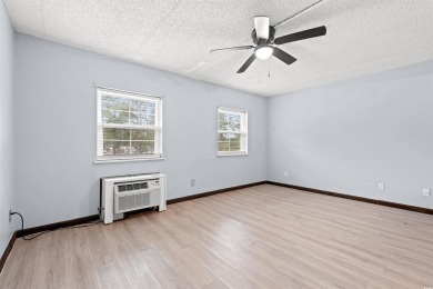 6.5 miles to Surfside Pier and gated community efficiency for on Heron Point Golf Club in South Carolina - for sale on GolfHomes.com, golf home, golf lot