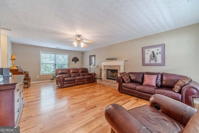 Welcome to 711 Wellington Drive, a charming home nestled in the on Monroe Golf and Country Club in Georgia - for sale on GolfHomes.com, golf home, golf lot