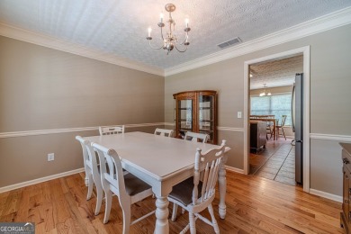 Welcome to 711 Wellington Drive, a charming home nestled in the on Monroe Golf and Country Club in Georgia - for sale on GolfHomes.com, golf home, golf lot
