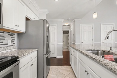 Welcome to this inviting two bedroom, two bathroom end unit on Mystical Golf Man O War Golf Links in South Carolina - for sale on GolfHomes.com, golf home, golf lot