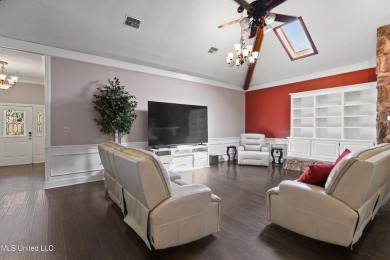 Enjoy timeless elegance and custom craftsmanship in this on Diamondhead Country Club in Mississippi - for sale on GolfHomes.com, golf home, golf lot