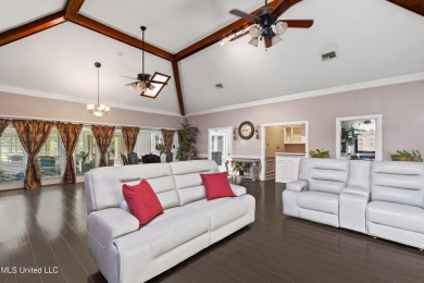 Enjoy timeless elegance and custom craftsmanship in this on Diamondhead Country Club in Mississippi - for sale on GolfHomes.com, golf home, golf lot