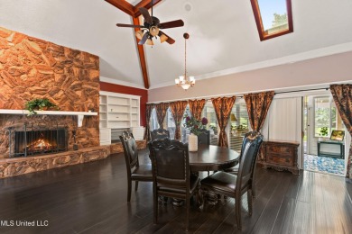 Enjoy timeless elegance and custom craftsmanship in this on Diamondhead Country Club in Mississippi - for sale on GolfHomes.com, golf home, golf lot