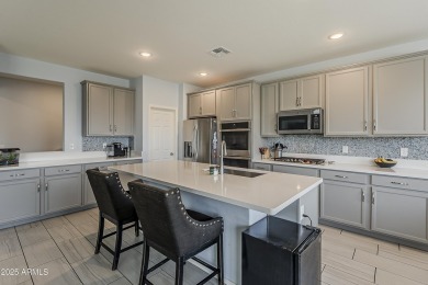 Welcome to this move-in ready 4 bed, 3 bath home in the on Verrado Golf Club - Victory in Arizona - for sale on GolfHomes.com, golf home, golf lot