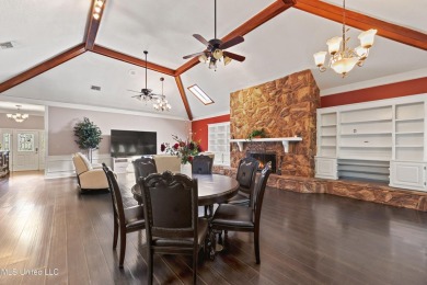Enjoy timeless elegance and custom craftsmanship in this on Diamondhead Country Club in Mississippi - for sale on GolfHomes.com, golf home, golf lot