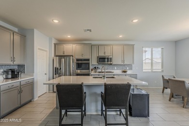 Welcome to this move-in ready 4 bed, 3 bath home in the on Verrado Golf Club - Victory in Arizona - for sale on GolfHomes.com, golf home, golf lot