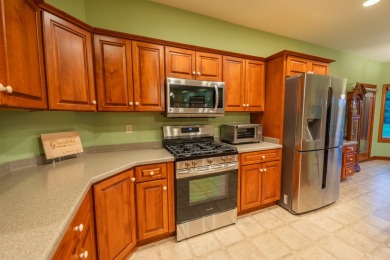 Stunning split ranch in highly desirable Watercress Springs in on Erin Hills Golf Course in Wisconsin - for sale on GolfHomes.com, golf home, golf lot