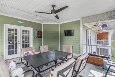 UPSTAIRS END UNIT OVERLOOKING SAPELO HAMMOCK GOLF COURSE WITH on Sapelo Hammock Golf Club in Georgia - for sale on GolfHomes.com, golf home, golf lot