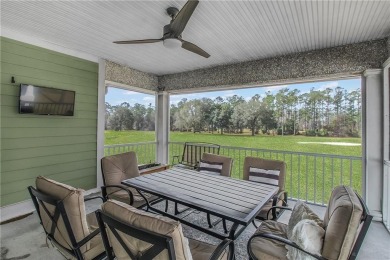 UPSTAIRS END UNIT OVERLOOKING SAPELO HAMMOCK GOLF COURSE WITH on Sapelo Hammock Golf Club in Georgia - for sale on GolfHomes.com, golf home, golf lot