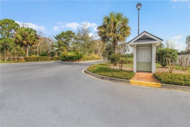 UPSTAIRS END UNIT OVERLOOKING SAPELO HAMMOCK GOLF COURSE WITH on Sapelo Hammock Golf Club in Georgia - for sale on GolfHomes.com, golf home, golf lot