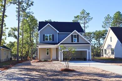 Imagine waking up to peaceful lake views in a brand-new home on The Lakes Country Club in North Carolina - for sale on GolfHomes.com, golf home, golf lot