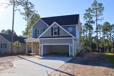 Imagine waking up to peaceful lake views in a brand-new home on The Lakes Country Club in North Carolina - for sale on GolfHomes.com, golf home, golf lot