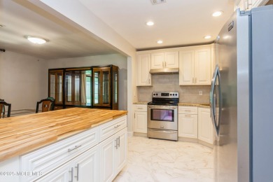 Welcome to this beautifully updated end unit condo located in on Shadow Lake Village in New Jersey - for sale on GolfHomes.com, golf home, golf lot
