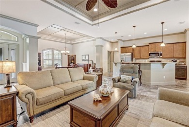 Step into elegance with this exceptional Pool Home nestled in on The Grand Club Cypress Course in Florida - for sale on GolfHomes.com, golf home, golf lot