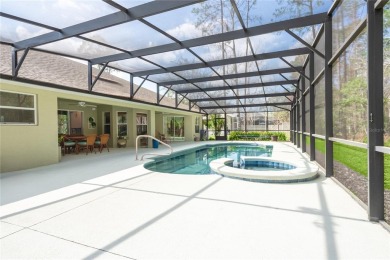 Step into elegance with this exceptional Pool Home nestled in on The Grand Club Cypress Course in Florida - for sale on GolfHomes.com, golf home, golf lot