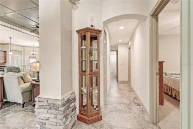 Step into elegance with this exceptional Pool Home nestled in on The Grand Club Cypress Course in Florida - for sale on GolfHomes.com, golf home, golf lot