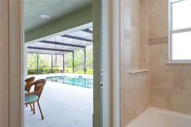 Step into elegance with this exceptional Pool Home nestled in on The Grand Club Cypress Course in Florida - for sale on GolfHomes.com, golf home, golf lot