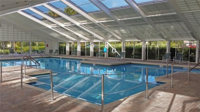 This stunning 2 bedroom, plus bonus room, Onyx model home is on Monarch At Royal Highlands in Florida - for sale on GolfHomes.com, golf home, golf lot