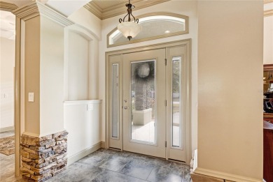 Step into elegance with this exceptional Pool Home nestled in on The Grand Club Cypress Course in Florida - for sale on GolfHomes.com, golf home, golf lot