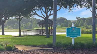 This stunning 2 bedroom, plus bonus room, Onyx model home is on Monarch At Royal Highlands in Florida - for sale on GolfHomes.com, golf home, golf lot