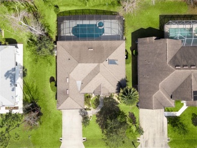Step into elegance with this exceptional Pool Home nestled in on The Grand Club Cypress Course in Florida - for sale on GolfHomes.com, golf home, golf lot