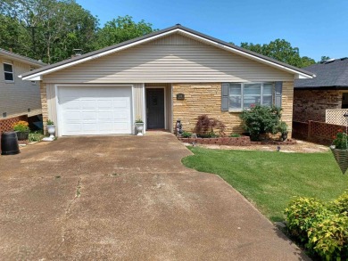 Beautifully remodeled 2-bedroom 2 bath home. Quaint 55 and older on Cedar Glade Golf Course in Arkansas - for sale on GolfHomes.com, golf home, golf lot