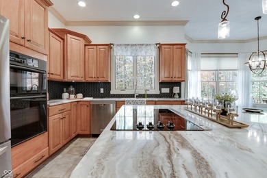 Nestled on a serene 1.53-acre Wooded lot directly across from on Bear Slide Golf Club in Indiana - for sale on GolfHomes.com, golf home, golf lot