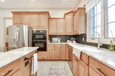 Nestled on a serene 1.53-acre Wooded lot directly across from on Bear Slide Golf Club in Indiana - for sale on GolfHomes.com, golf home, golf lot