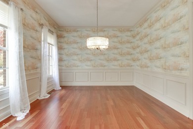 Nestled on a serene 1.53-acre Wooded lot directly across from on Bear Slide Golf Club in Indiana - for sale on GolfHomes.com, golf home, golf lot