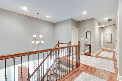 Nestled on a serene 1.53-acre Wooded lot directly across from on Bear Slide Golf Club in Indiana - for sale on GolfHomes.com, golf home, golf lot