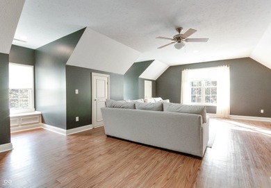 Nestled on a serene 1.53-acre Wooded lot directly across from on Bear Slide Golf Club in Indiana - for sale on GolfHomes.com, golf home, golf lot