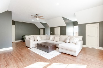 Nestled on a serene 1.53-acre Wooded lot directly across from on Bear Slide Golf Club in Indiana - for sale on GolfHomes.com, golf home, golf lot