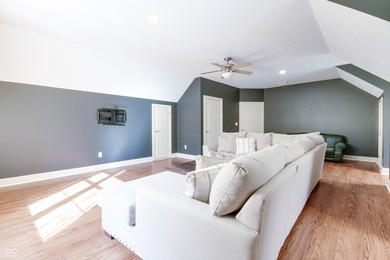 Nestled on a serene 1.53-acre Wooded lot directly across from on Bear Slide Golf Club in Indiana - for sale on GolfHomes.com, golf home, golf lot