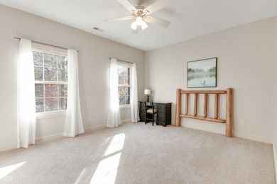 Nestled on a serene 1.53-acre Wooded lot directly across from on Bear Slide Golf Club in Indiana - for sale on GolfHomes.com, golf home, golf lot