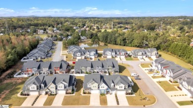 Welcome to this beautiful end-unit townhouse nestled in the on Smithfields Country Club in South Carolina - for sale on GolfHomes.com, golf home, golf lot