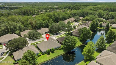 This is a rare opportunity to own a water-view home in the on Windsor Parke Golf Club in Florida - for sale on GolfHomes.com, golf home, golf lot