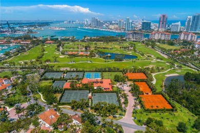 Live a boater's dream in this stunning Harborview ground floor on Fisher Island Club in Florida - for sale on GolfHomes.com, golf home, golf lot