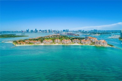 Live a boater's dream in this stunning Harborview ground floor on Fisher Island Club in Florida - for sale on GolfHomes.com, golf home, golf lot