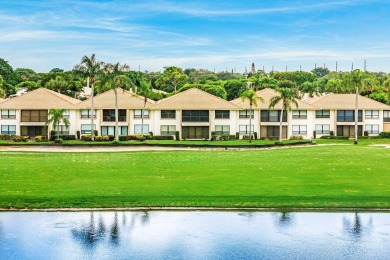 Spectacular lake and lush double fairway views from this 1st on Pine Tree Golf Club in Florida - for sale on GolfHomes.com, golf home, golf lot