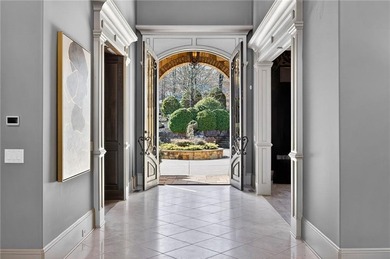 Perfectly positioned to capture sweeping views of the lake and on Manor Golf and Country Club in Georgia - for sale on GolfHomes.com, golf home, golf lot