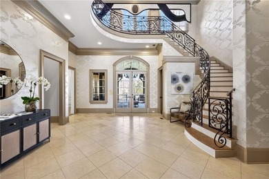 Perfectly positioned to capture sweeping views of the lake and on Manor Golf and Country Club in Georgia - for sale on GolfHomes.com, golf home, golf lot